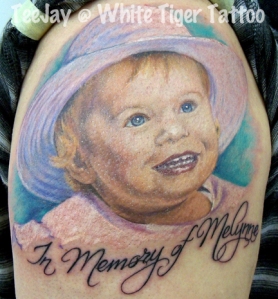 "In Memory of" tattoo