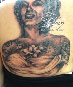 marilyn monroe tattoo with chest tattoo