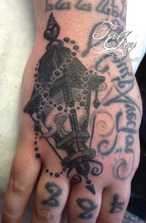 new orleans lantern hand tattoo